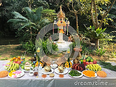 Spirit house worship ceremony with food set Stock Photo