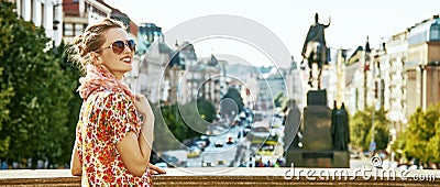 Tourist woman on Vaclavske namesti in Prague having excursion Stock Photo