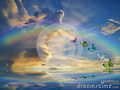 Spiritual background for meditation with clouds sky, rainbow and butterflies Stock Photo