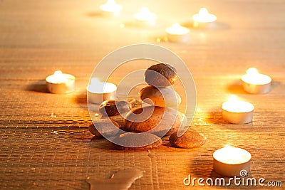 Spiritual purity atmosphere with oil lamps in temple. Stone bala Stock Photo