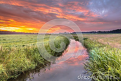 Spiritual voyage concept summer sunrise over lowland river Stock Photo