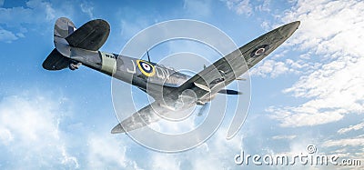 Spitfire fighter plane flying in blue sky Stock Photo
