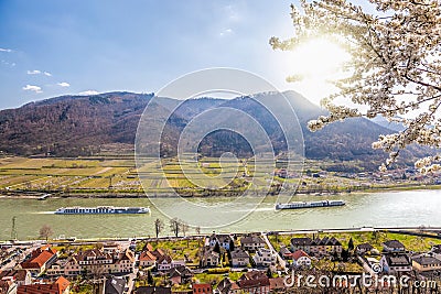 Spitz village with ships on Danube river in Wachau valley during spring time, Austria Stock Photo