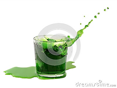 Splash from ice cube in a glass of green water or drink Stock Photo