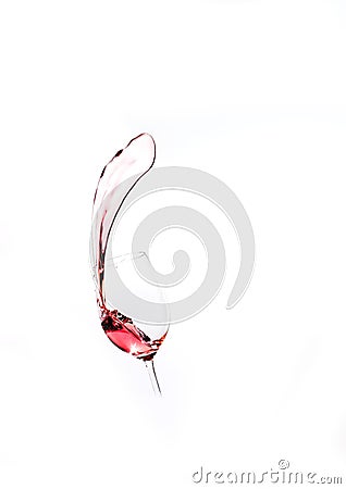 Splash of red wine from the glass Stock Photo