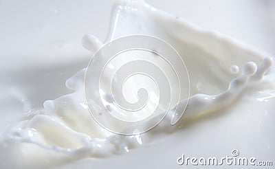 Splash and splashes from falling milk like a crownor a ball Stock Photo