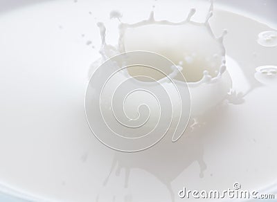 Splash and splashes from falling milk like a crown Stock Photo