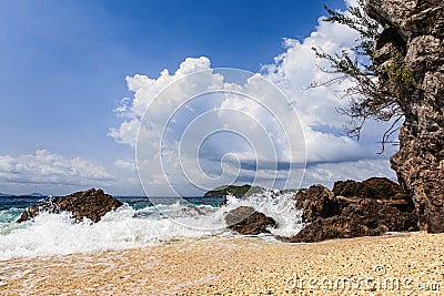 Splash water on beach Stock Photo