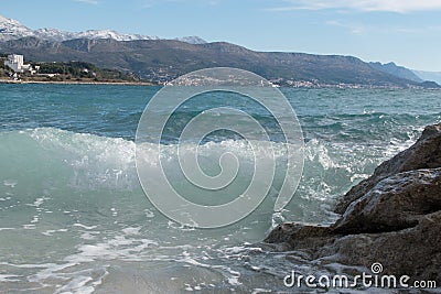 Splash of wave coming on seashore Stock Photo