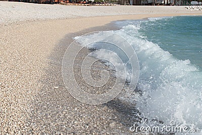 Splash of wave coming on seashore Stock Photo