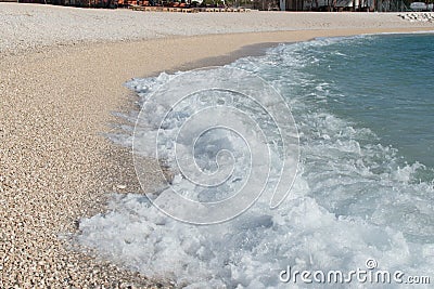 Splash of wave coming on seashore Stock Photo