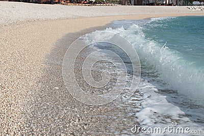 Splash of wave coming on seashore Stock Photo