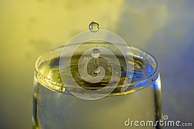 Splashes of dancing water drops. Stock Photo
