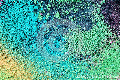 A splatter of green blue natural colored pigment powder on black background Stock Photo