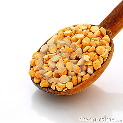 Split Bengal Gram on wooden spoon, Isolated Stock Photo