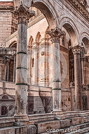 Split, Croatia - Aug 15, 2020: Pillars of old arch at Diocletian's Palace in old town Stock Photo