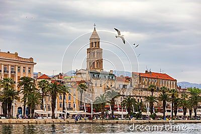 Split, Croatia (region of Dalmatia). UNESCO World Heritage Site. View of Split city with flying seagull's over promenade. Split Stock Photo