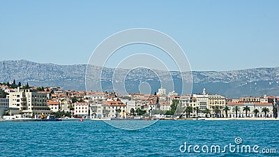 Split, Croatia - 07 22 2015 - Scenic view of the city with mountain background from the water, beautiful cityscape, sunny day Editorial Stock Photo