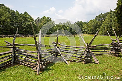 Split-Rail Fence in Farm Field Stock Photo