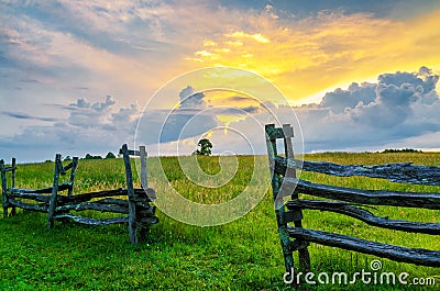 Split rail fence and sunset, Cumberland Gap Natl Park Stock Photo