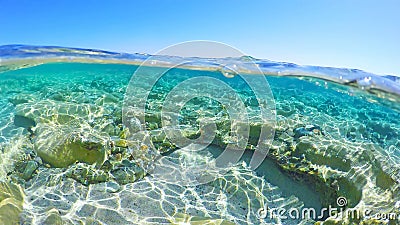 Split underwater in Piscina Rei Stock Photo