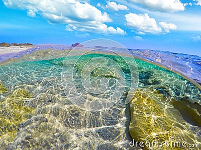 Split underwater view of Costa Rei shore Stock Photo