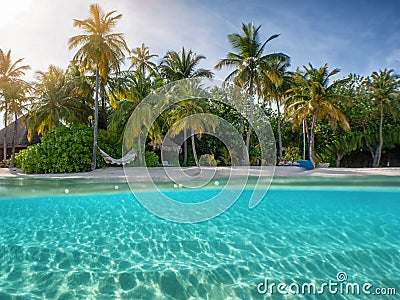 Split view to a tropical beach on the Maldives Stock Photo