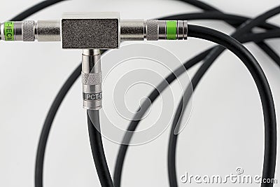 Splitter of TV signal with coax cable Stock Photo