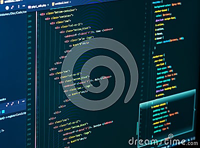 Splitting of html and css in the code editor on the monitor, close up. Web Design and Web development Stock Photo