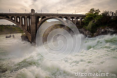 The Spokane river in spring flood near downtown Spokane, Washington Stock Photo