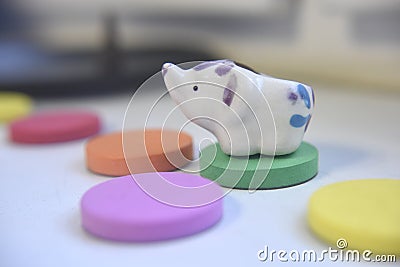 Spongy flat items of different colours on the white background indoor Stock Photo