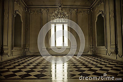 Spooky baroque style room with window, sunbeam and terracotta fl Stock Photo