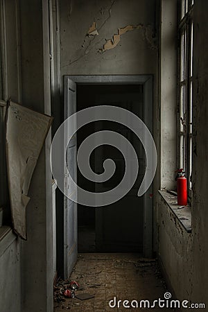 Spooky door in a haunted house Stock Photo