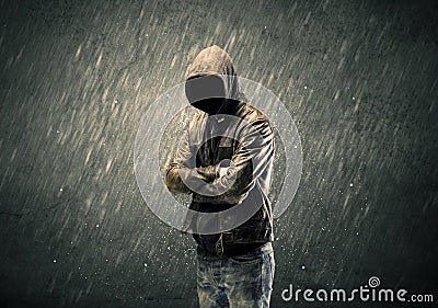 Spooky faceless guy standing in hoodie Stock Photo