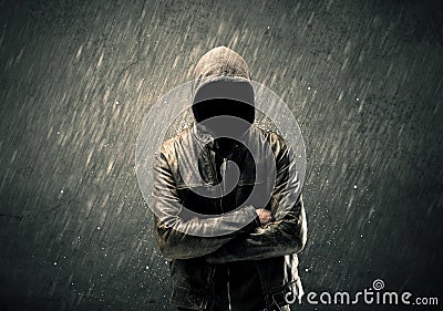 Spooky faceless guy standing in hoodie Stock Photo