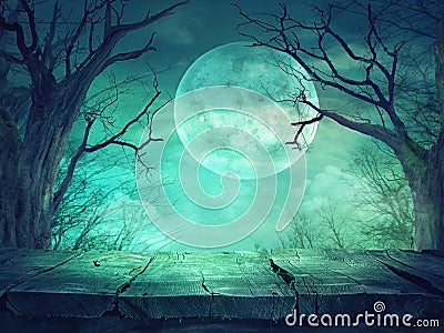 Spooky forest with full moon and wooden table Stock Photo