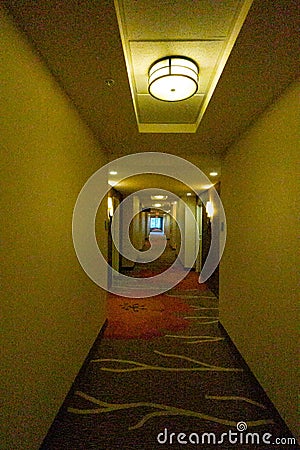 Grainy Empty Hotel Room at Night Stock Photo