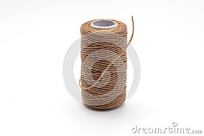 Spool of waxed brown sewing threads Stock Photo