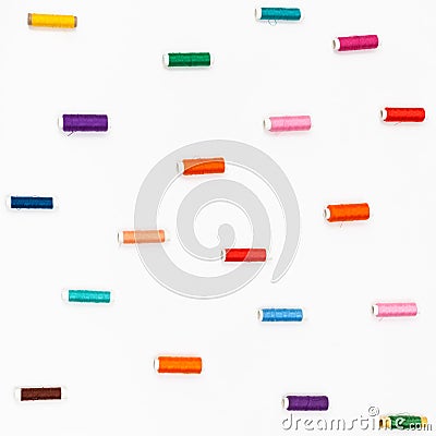 Spools of sewing color threads on white Stock Photo