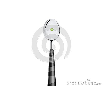 Spoon with green peas Stock Photo