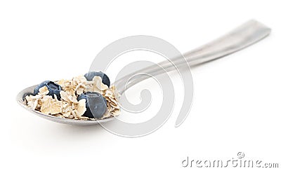 Spoon With Oatmeal and Blueberries Stock Photo