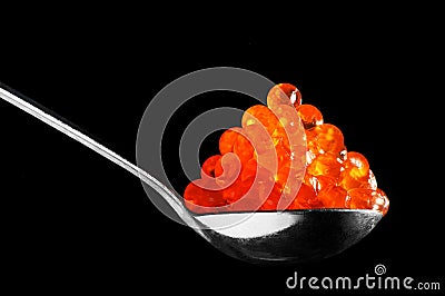 Spoon with red caviar Stock Photo