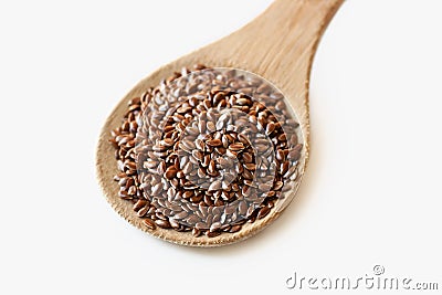 Spoonful of flax seeds isolated on white Stock Photo