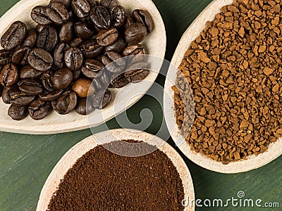 Spoonfuls of Instant Granulated and Roast Coffee Beans Stock Photo