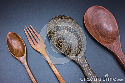 Spoons, forks, ladles made of wood Stock Photo