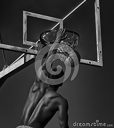 Sport. Basketball player in action -- black and white toned photo Stock Photo