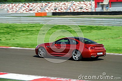 Sport car fast moving on track Stock Photo