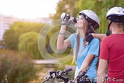 Sport and cycling Concept: Young Caucasian Cyclist Resting Toget Stock Photo