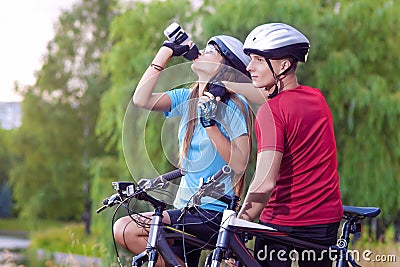 Sport and cycling Concept: Young Caucasian Cyclist Resting Toget Stock Photo