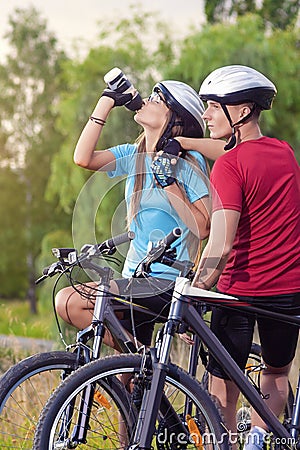 Sport and cycling Concept: Young Caucasian Cyclist Resting Toget Stock Photo